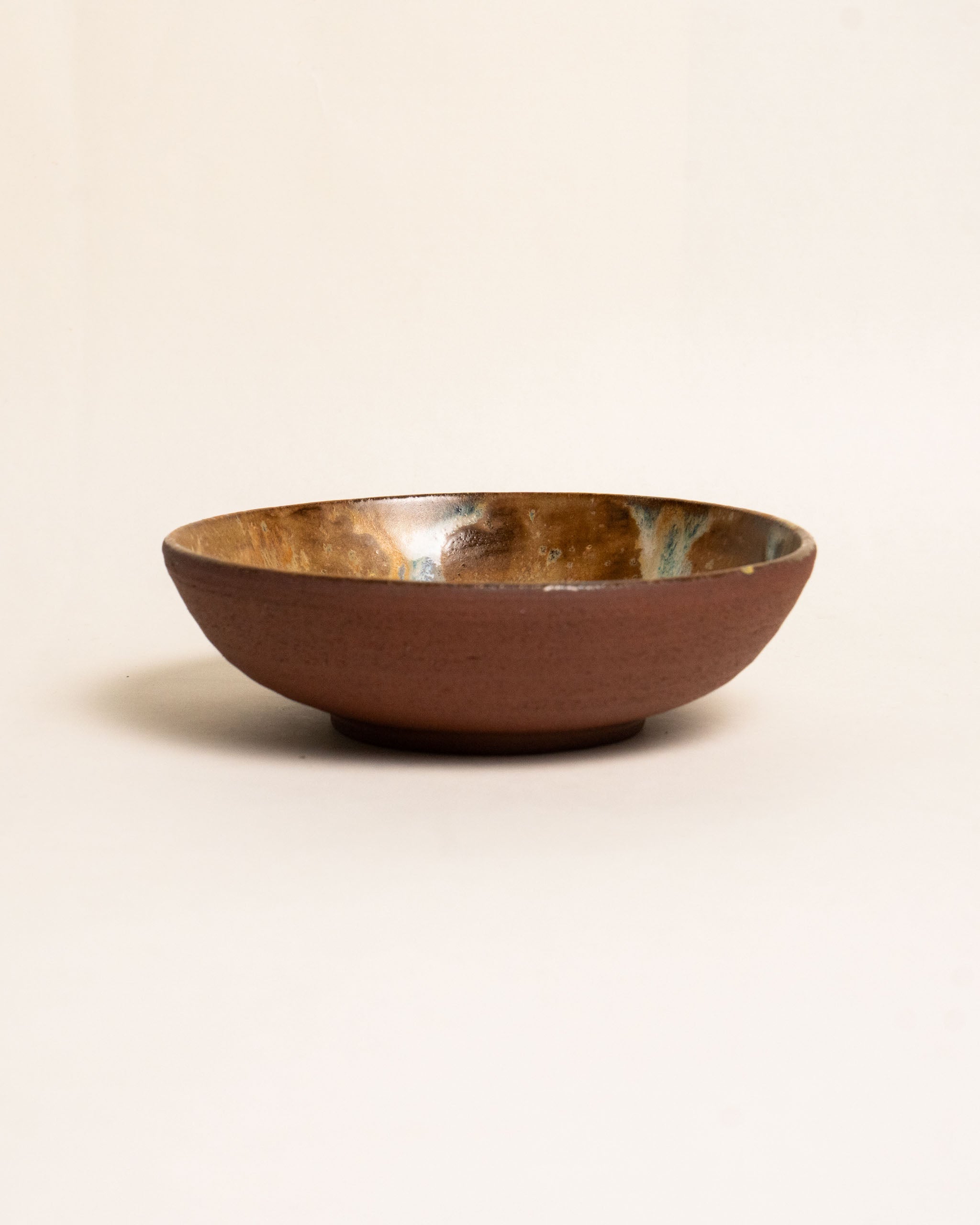 THE SMALL BROWN BOWL