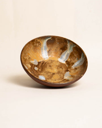 THE SMALL BROWN BOWL